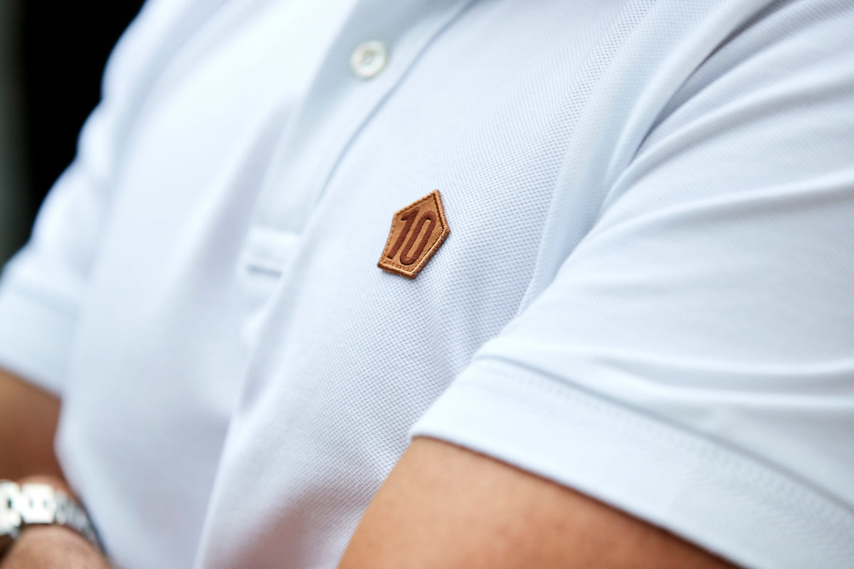 Introducing The Fixture polo.